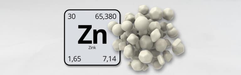 Zinktabletten neben dem Periodensymbol Zn